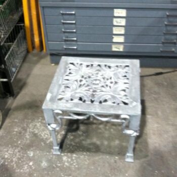 dolphin deco cast iron matte grey occasional table rental