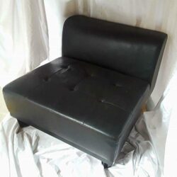 burtonesque couch armless sectional black leather chair rental