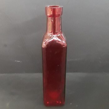 vintage bottle red clear bottle vessel flowers rental