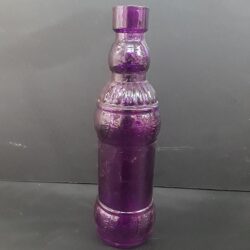 colored bottle purple glass bottle vessel flowers rental