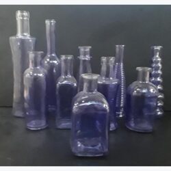 vintage bottle purple blue clear glass vessel flowers rental