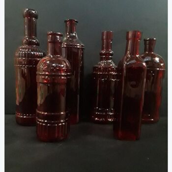 vintage bottle red clear bottle vessel flowers rental