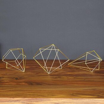 geometric frames brass gold home decor rental