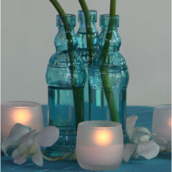 colored bottle aqua blue glass bottle vessel flowers rental