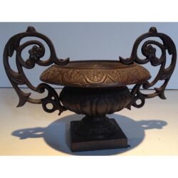 scroll handle urn cast iron vessel metal flowers rental