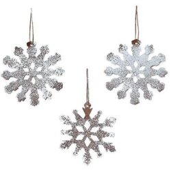 Three silver snowflake Christmas ornaments hanging